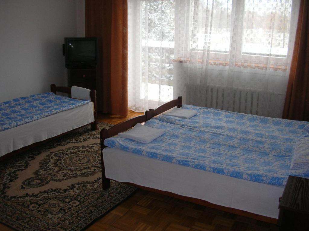 Ferienwohnung Pensjonacik Albatros Mikołajki Zimmer foto